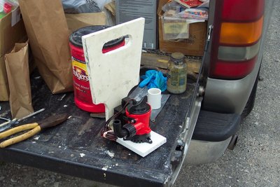 Bilge pump on mounting bracket